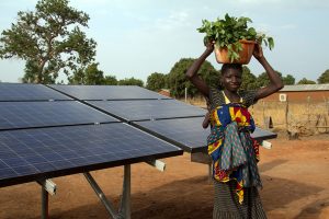 African business woman enjoying solar power.